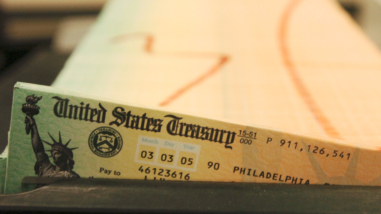 Photo of trays of printed social security checks