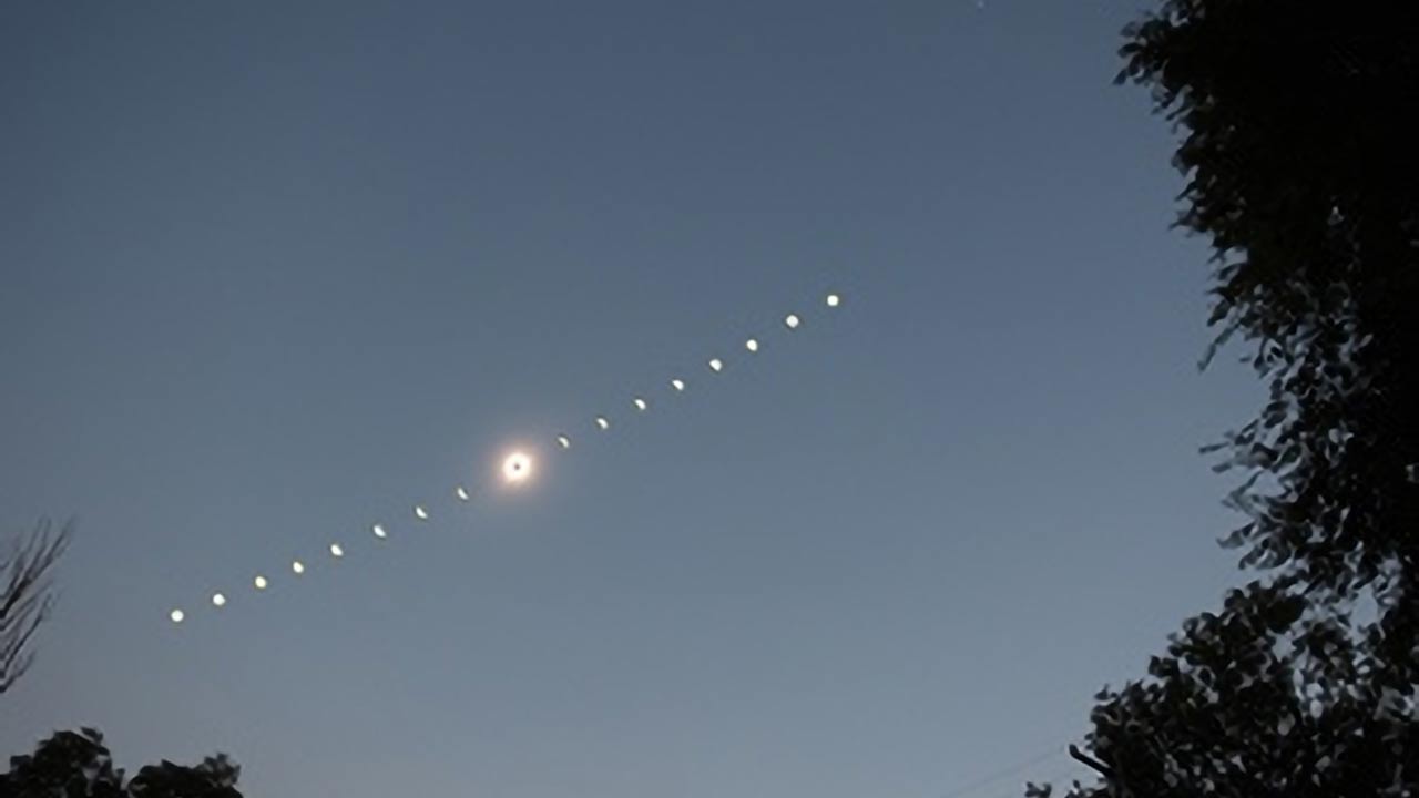 Wide-field composite, with partial phases shown on a background taken during totality. Full-color image taken with a Canon T5 Rebel DSLR camera (camera "George") at ISO 200 through a Rokinon 16M-C 16mm f/2.0 Aspherical Wide-Angle Lens, with an exposure time of 0.3s (set by the camera) during totality, and of 30s and through a Thousand Oaks solar filter during the partial phases, by F. Ringwald