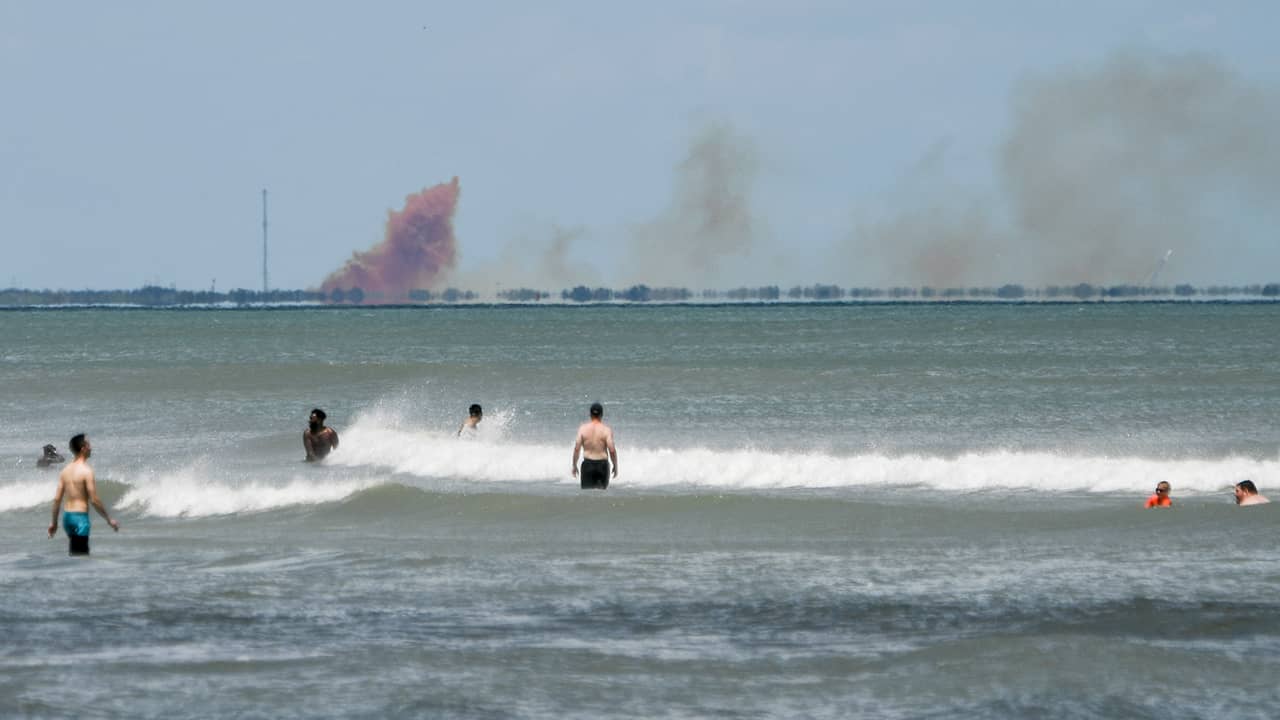 Photo of a cloud of smoke over the Cape Canaveral Air Force Station, seen from Cocoa Beach, Fla.