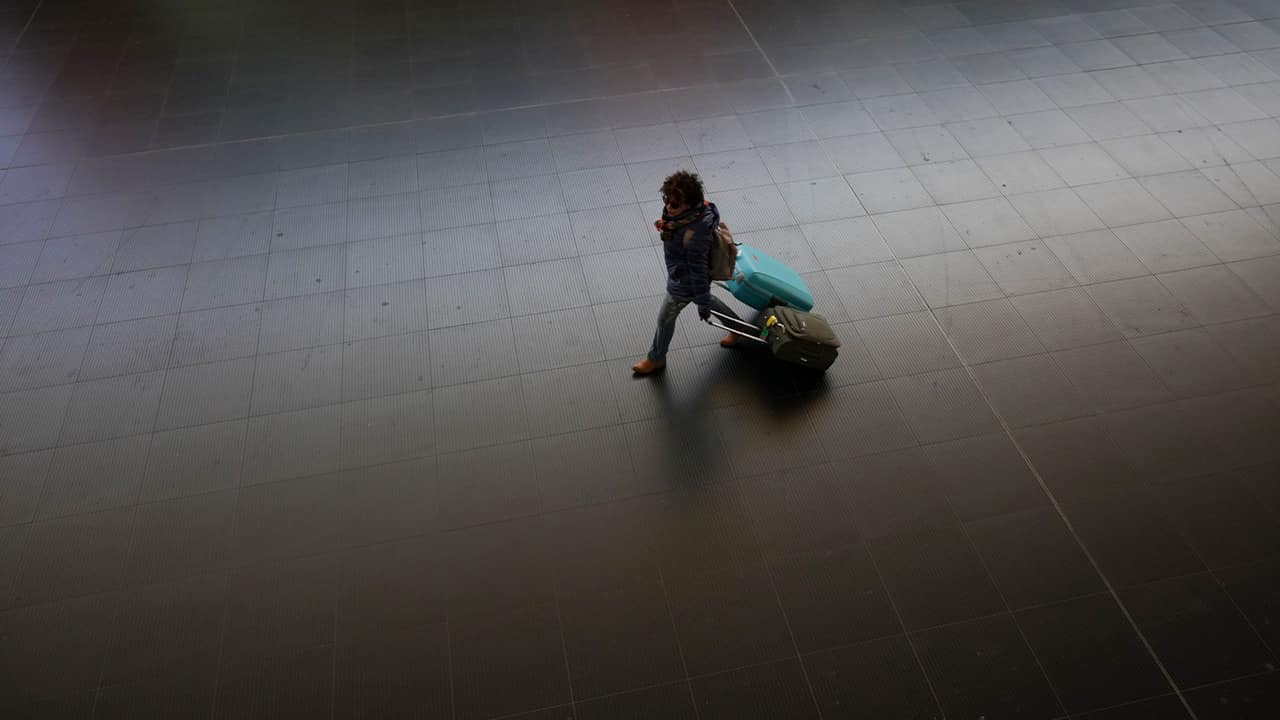 Photo of a person at a train station in Spain 