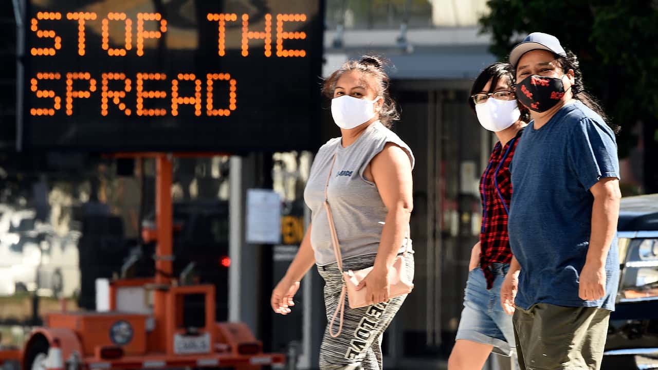 Photo of people wearing masks 
