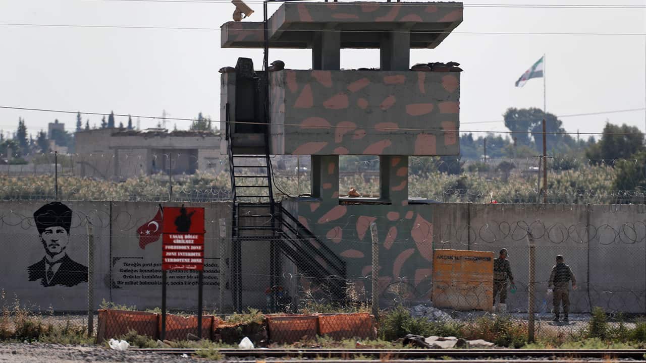 Photo of Turkish soldiers standing at an outpost 