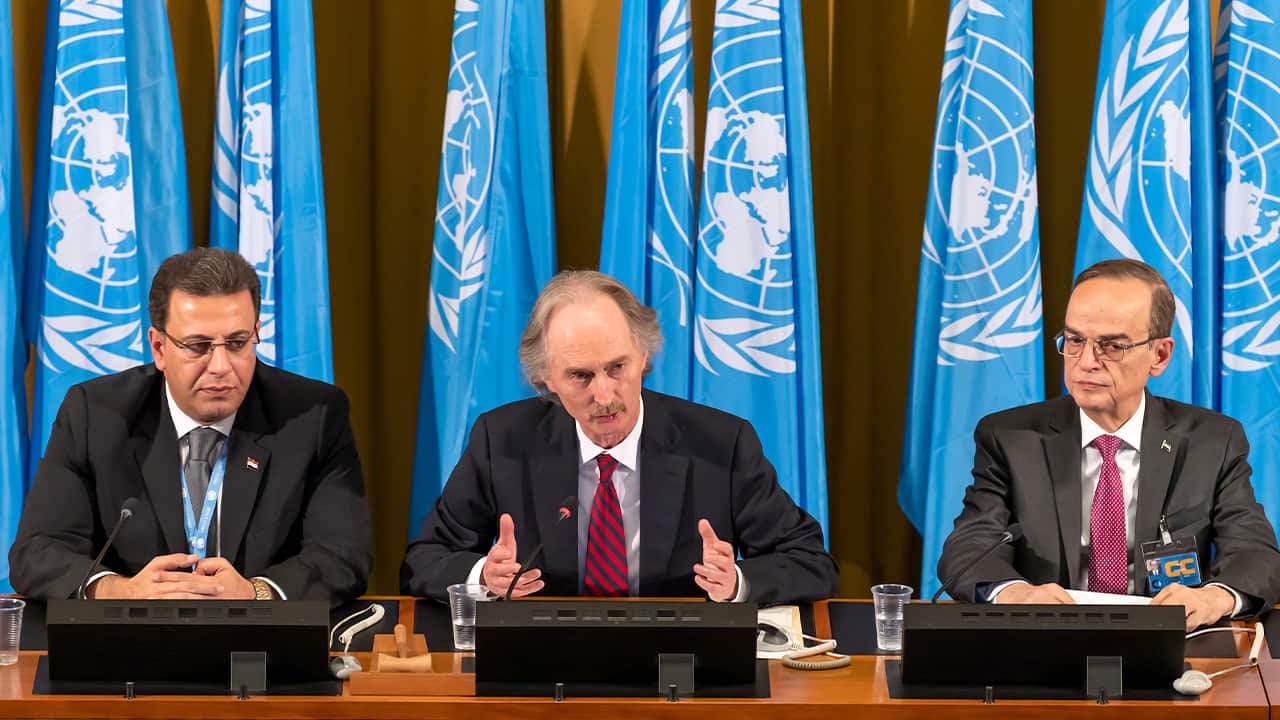 Photo of Constitutional Committee Co-Chairman Ahmad Kuzbari, representative of the Syrian Government, Geir O. Pedersen, Special Envoy for Syria and the Constitutional Committee Co-Chairman, Hadi al-Bahra, representative of the Syrian opposition
