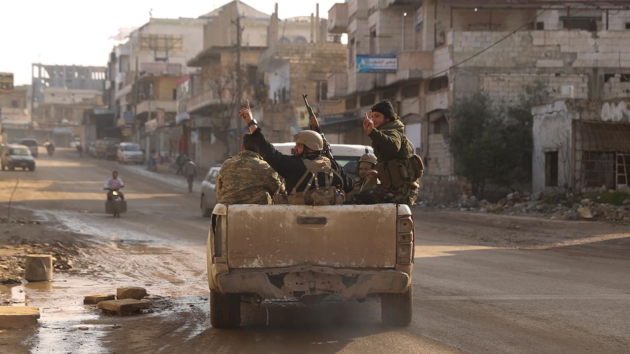 Photo of Syrian rebels driving in Nerab