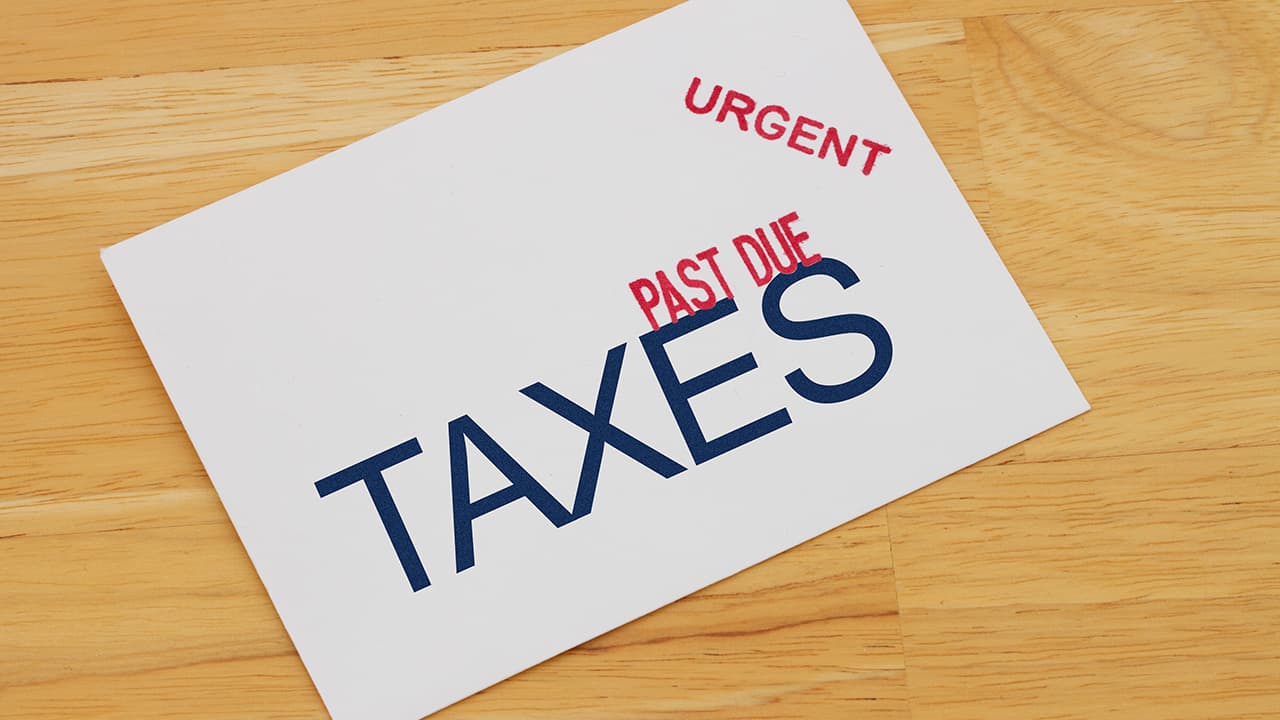 Photo illustration of a late tax noticeI