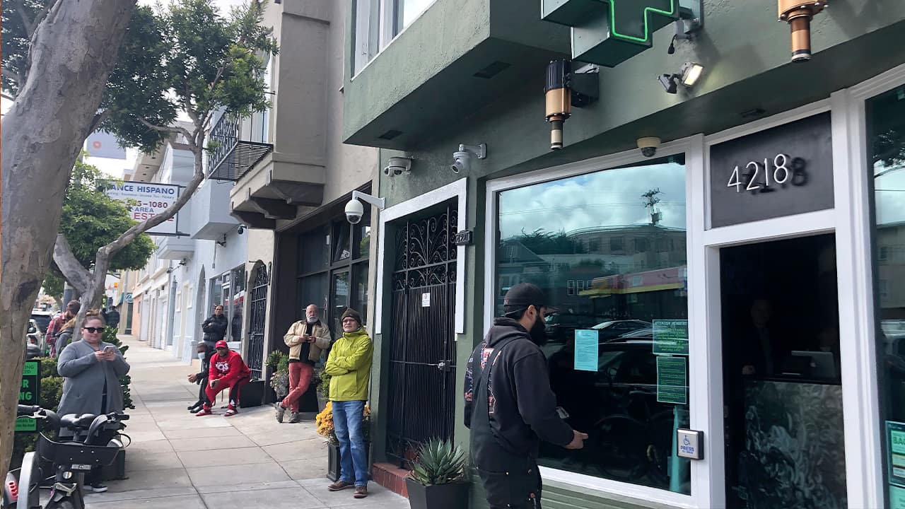Photo of people waiting outside The Green Cross in San Francisco