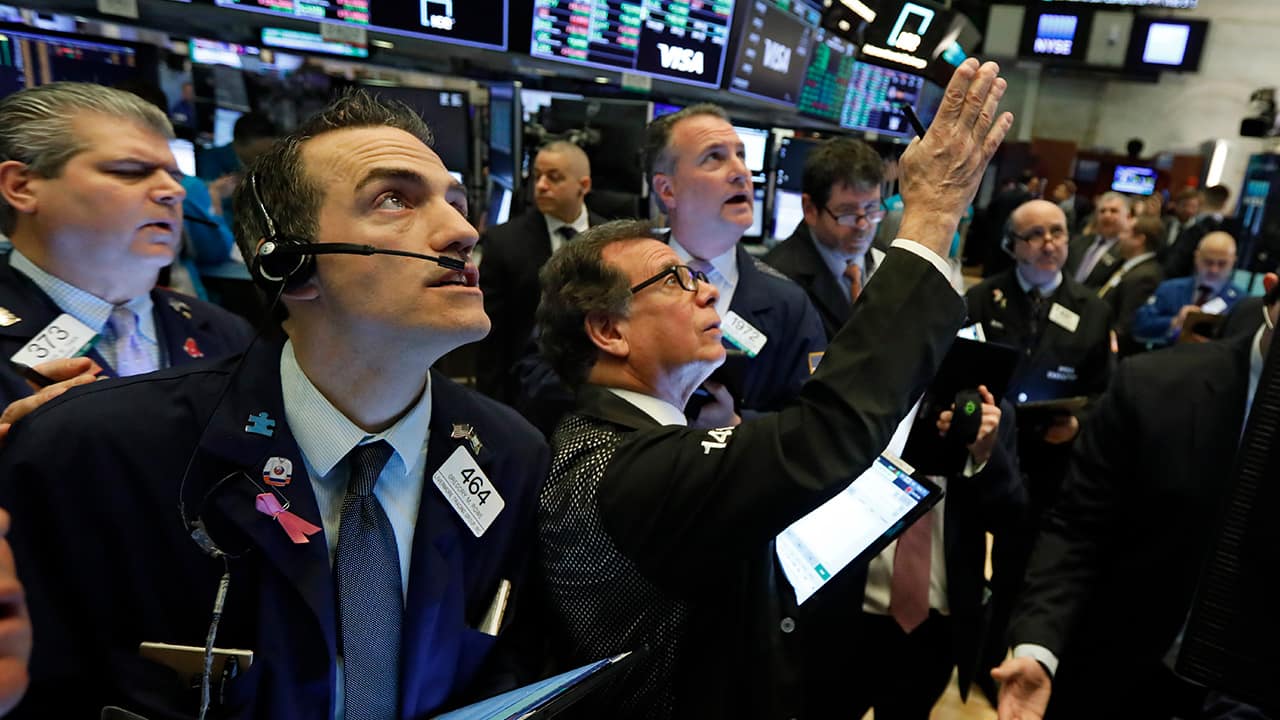 Photo of traders on the floor of the New York Stock Exchange