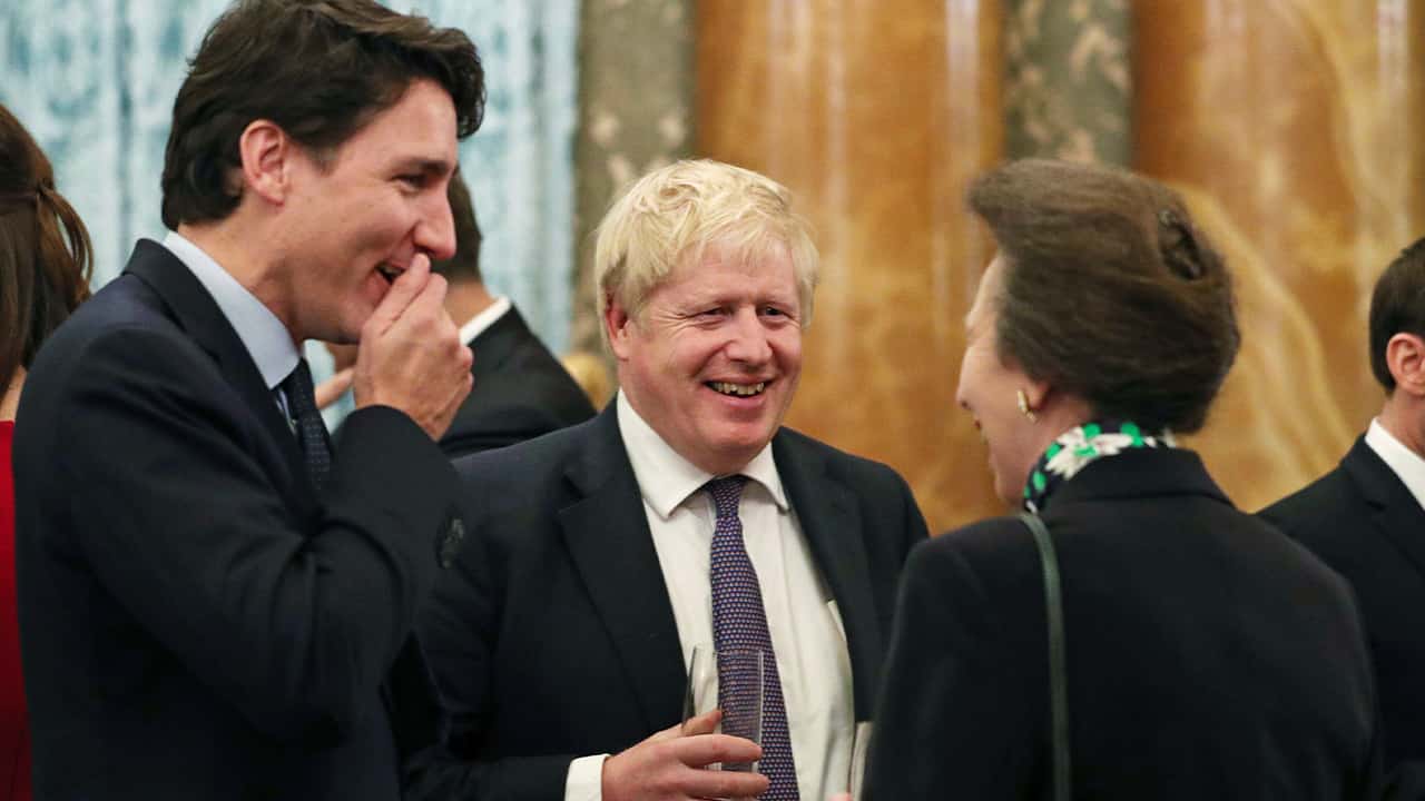 Photo of Britain's Princess Anne The Princess Royal, Canadian Prime Minister Justin Trudeau and Britain's Prime Minister Boris Johnson