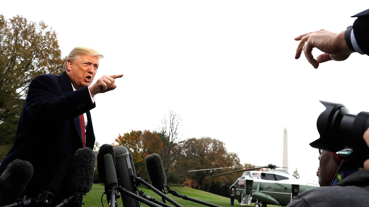 Photo of President Donald Trump talking to the media