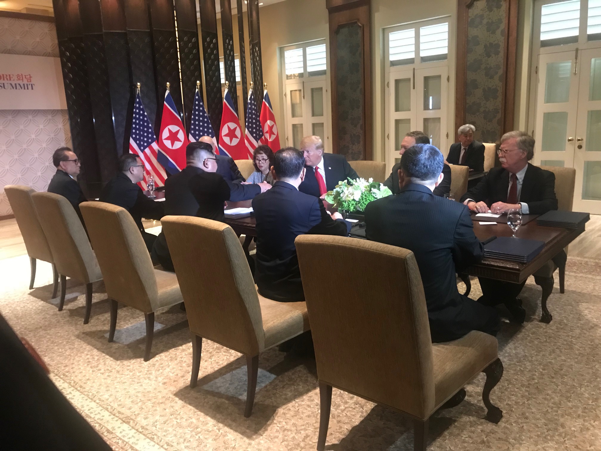 Photo of meeting between President Donald Trump and North Korea's Kim Jong Un