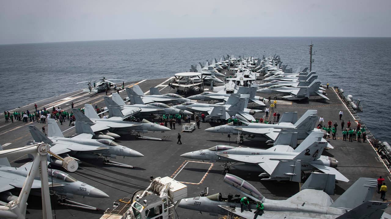 Photo of sailors partaking in a foreign object and debris walk-down