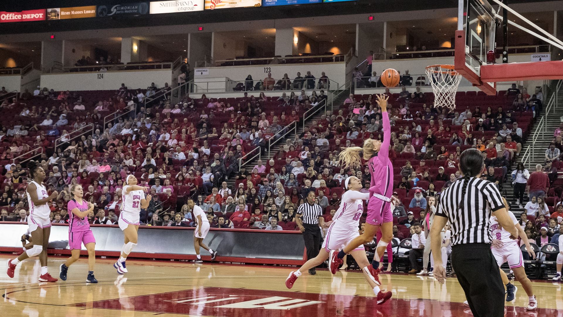 Photo of Fresno State's Maddi Utti going for two of her 20 points against UNLV