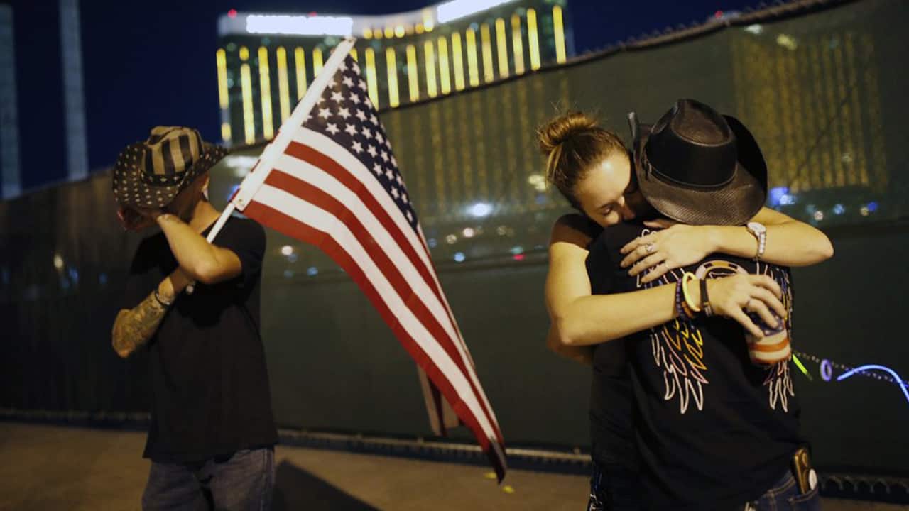 Photo of people on the first anniversary of the Las Vegas shooting
