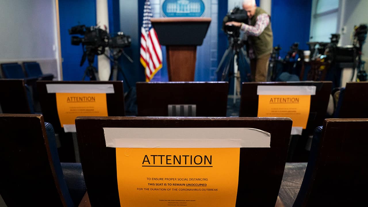 Photo of signs in the briefing room of the White House 