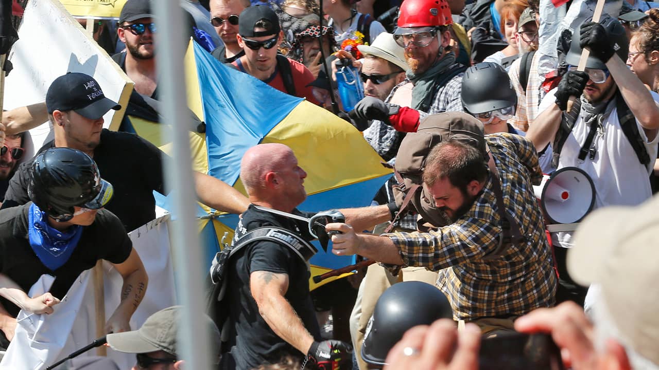 Photo of white nationalist demonstrators clashing with counter demonstrators
