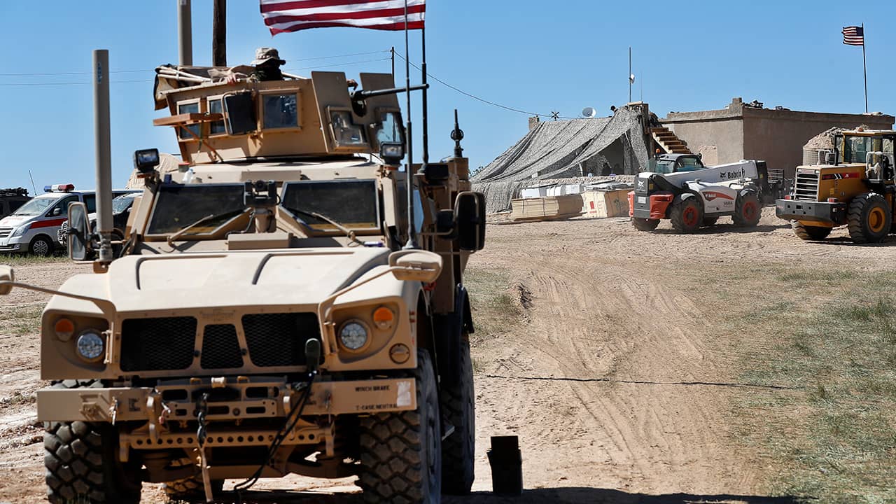 Photo of a US soldier sitting in an armored vehicle