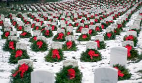 Photo of wreaths in snow at Arlington National Cemetery