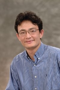 Portrait of UCLA professor Yufeng Lu, who is researching a cure for hangovers.