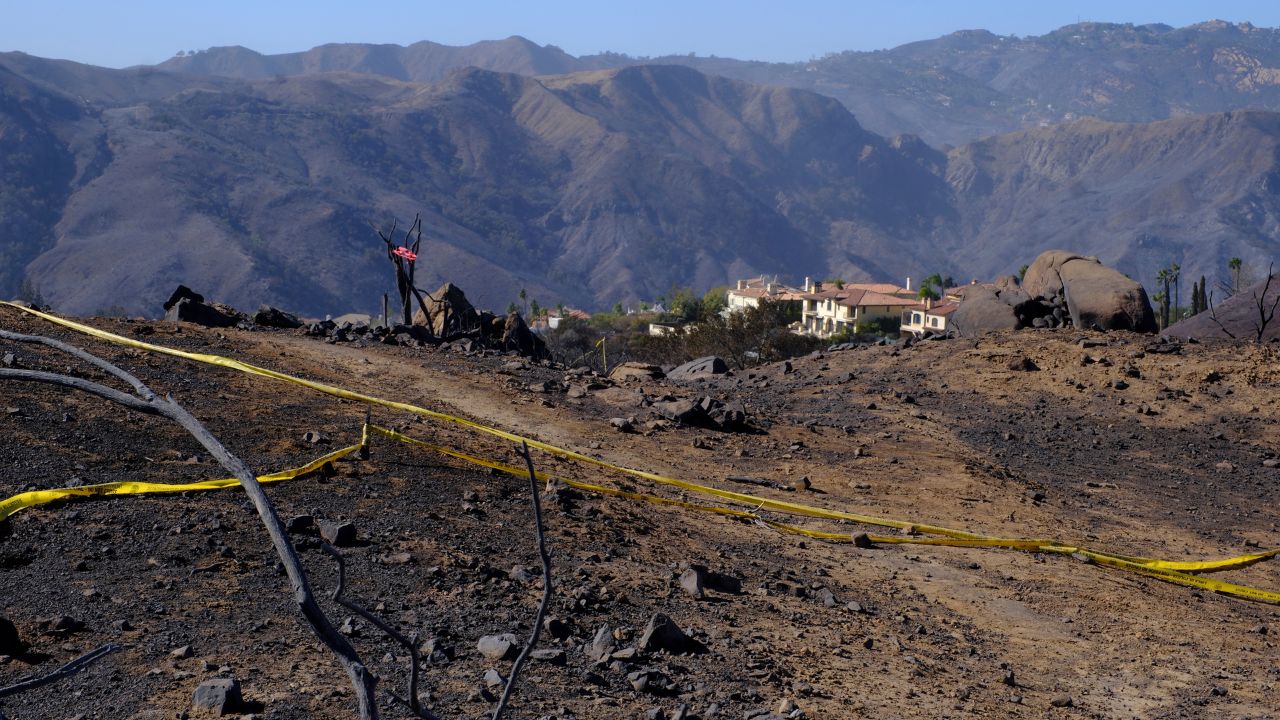 Crime scene tape at the possible origin of the Palisades fire in Los Angeles, Jan. 12, 2025. In the hills above the Pacific Palisades neighborhood, there is crime scene tape and scattered debris, clues to what may have caused the initial fire that eventually raged through thousands of structures. (Blacki Migliozzi/The New York Times)