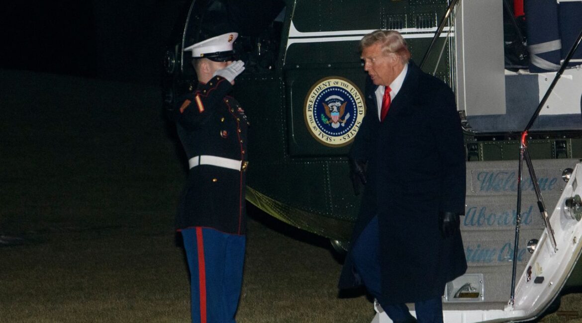 President Donald Trump greets a Marine Corps honor guard as he disembarks Marine One upon arrival on the South Lawn of the White House in Washington, Monday, Jan. 27, 2025. (AP/Rod Lamkey, Jr.)