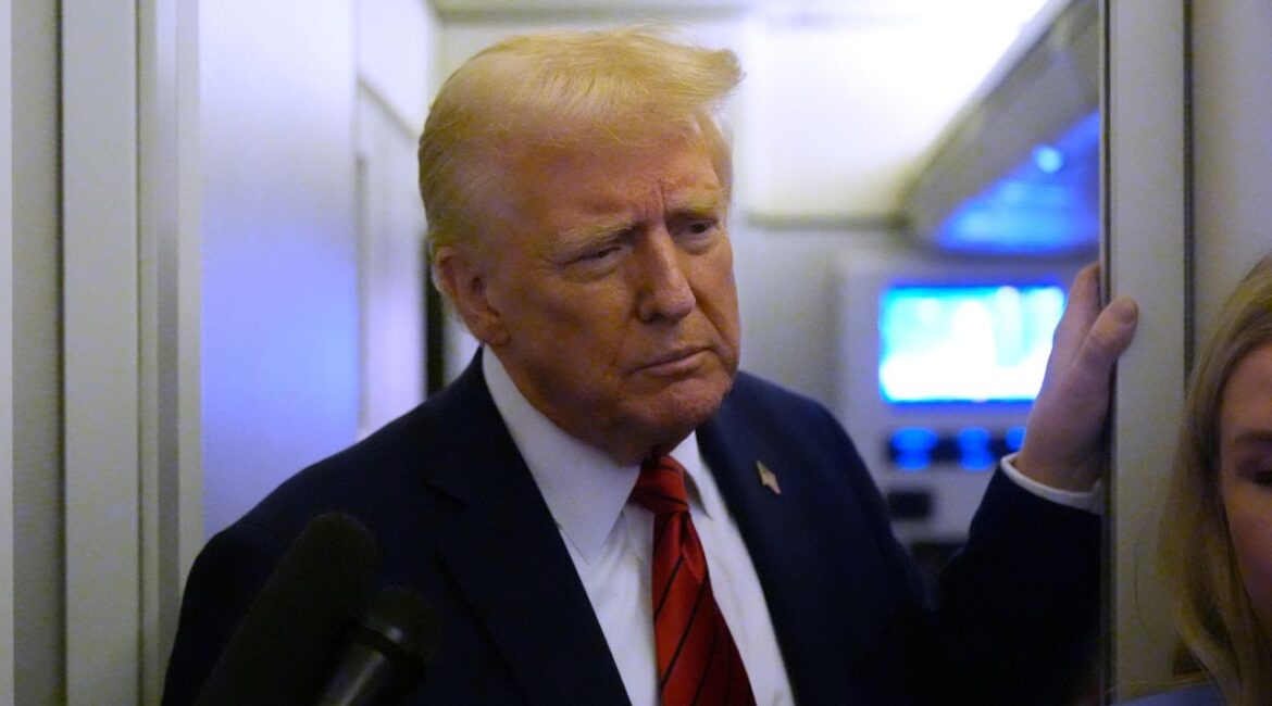 President Donald Trump speaks to reporters aboard Air Force One en route from Miami to Joint Base Andrews, Md., Monday, Jan. 27, 2025. (AP/Mark Schiefelbein)