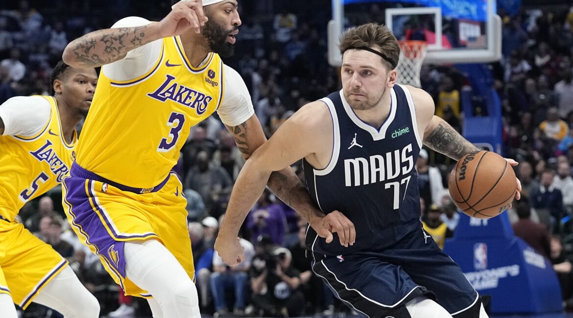 Anthony Davis guards Luka Doncic