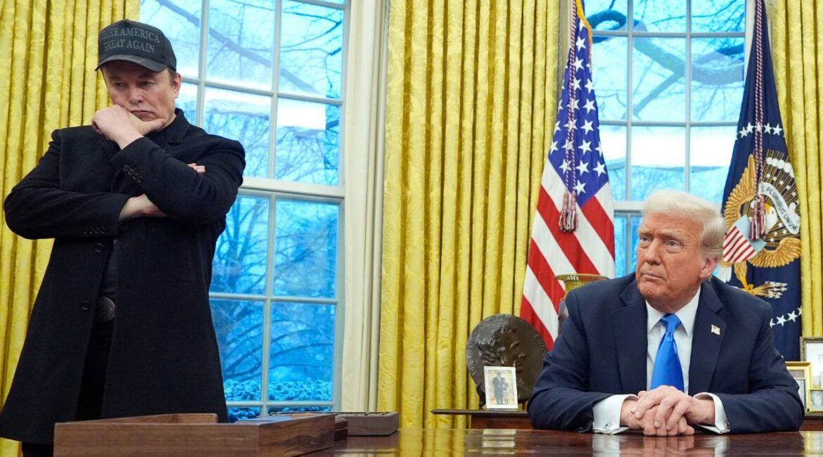 Elon Musk listens as President Donald Trump speaks with reporters in the Oval Office at the White House, Tuesday, Feb. 11, 2025, in Washington. (AP/Alex Brandon)