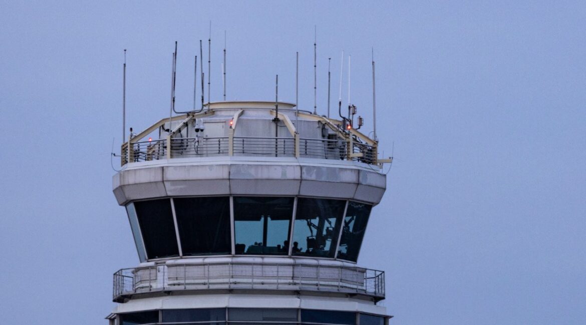 FILE — The air traffic control tower at Ronald Reagan National Airport in Arlington, Va., on Jan. 30, 2025. Transportation Secretary Sean Duffy announced on Thursday, Feb. 27, that the Federal Aviation Administration would increase the pay for air traffic controller trainees by $5 an hour as a part of an effort to boost recruitment and retention. (Maansi Srivastava/The New York Times)