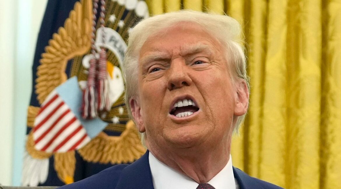 President Donald Trump speaks to reporters after signing an executive order in the Oval Office of the White House, Thursday, Feb. 13, 2025, in Washington. (AP Photo/Ben Curtis)