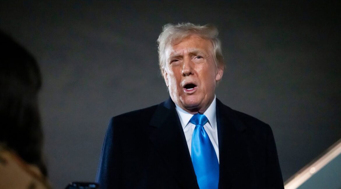 President Donald Trump speaks to reporters next to Air Force One after arriving back at Joint Base Andrews, Md., Sunday, Feb. 2, 2025. (AP/Ben Curtis)
