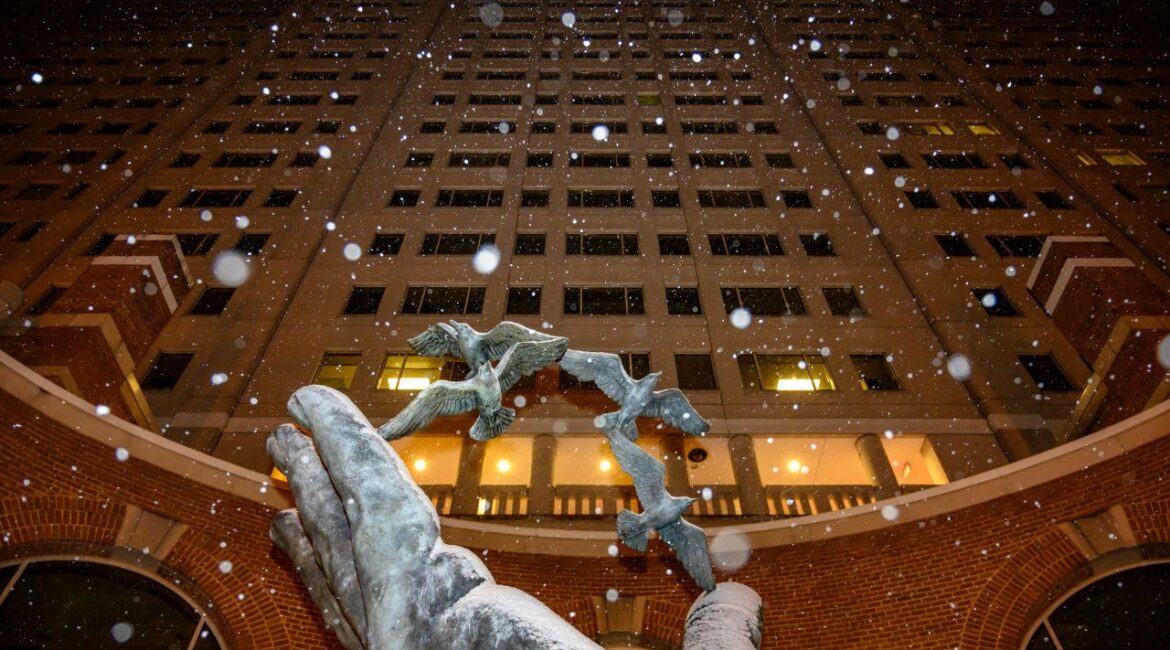 Snow falls on the National Oceanic and Atmospheric Administration offices in Silver Spring, Md., Jan. 12, 2019. The Trump administration has begun firing employees at the National Oceanic and Atmospheric Administration, one of the world’s premier centers for climate science. (Matt Roth/The New York Times)