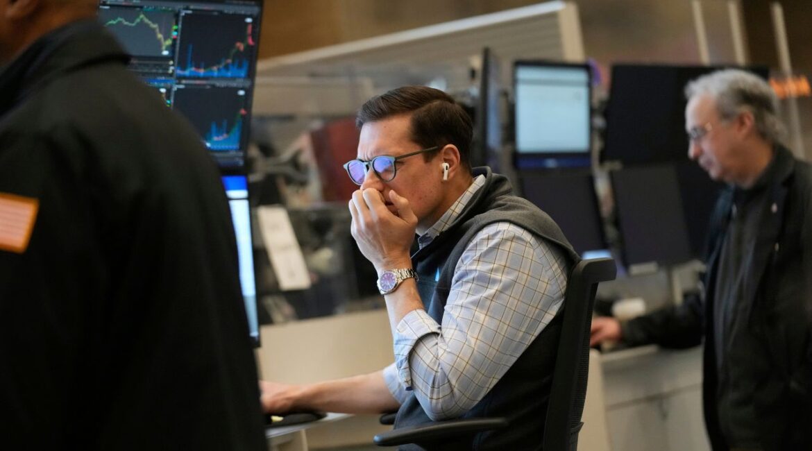 People work on the options floor at the New York Stock Exchange in New York, Tuesday, March 4, 2025. (AP/Seth Wenig)