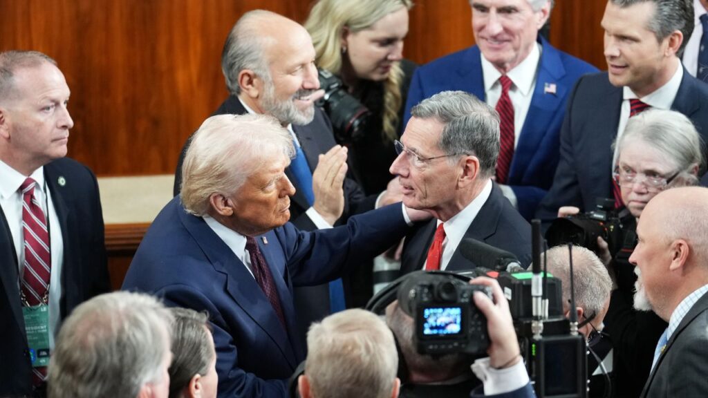 President Donald Trump, left, speaks with Sen. John Barrasso (R-Wyo.) after delivering an address to a joint session of Congress at the Capitol in Washington, on Tuesday, March 4, 2025. (Doug Mills/The New York Times)