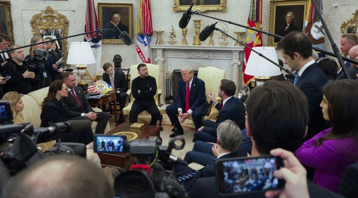 Vice President JD Vance, center right, speaks with Ukrainian President Volodymyr Zelenskyy, center left, as President Donald Trump, center, listens in the Oval Office at the White House, Friday, Feb. 28, 2025, in Washington. (AP/Mystyslav Chernov)