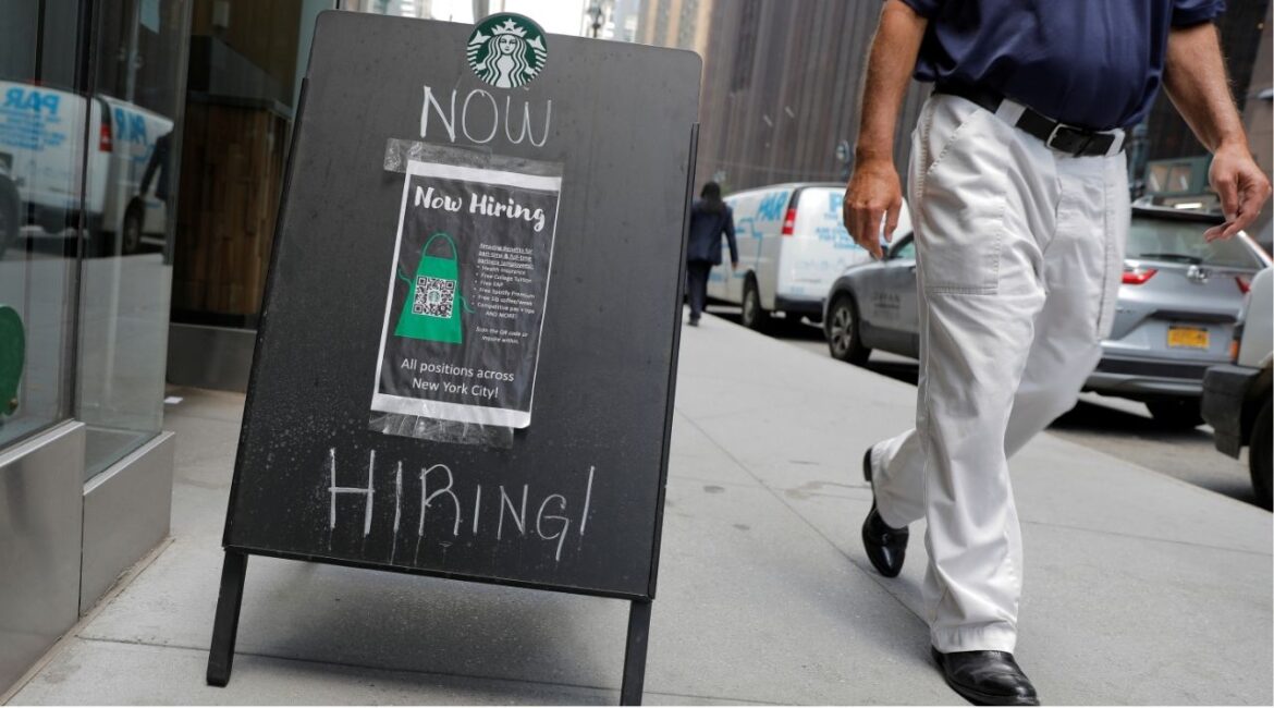 A sign advertising job openings is seen outside of a Starbucks in Manhattan, New York City, New York, U.S., May 26, 2021. (REUTERS/Andrew Kelly/File photo)