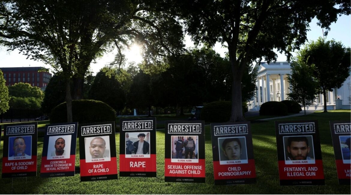 In his first hundred days in office, Trump has moved to strip legal immigration status from hundreds of thousands of people. On Sunday, the White House plastered across the lawnposters of people described as arrested illegal immigrants. (REUTERS/Evelyn Hockstein)