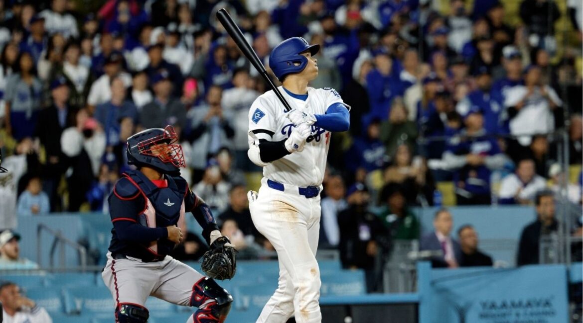 Los Angeles Dodgers' Shohei Ohtani hits a walk-off solo home run against as Atlanta Braves catcher Atlanta Braves' Chadwick Tromp looks on during the ninth inning of a baseball game Wednesday, April 2, 2025, in Los Angeles. (AP/Kevork Djansezian)