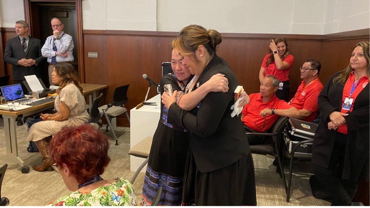 Misty Her greets board meeting attendees prior to being announced superintendent finalist on April 23, 2025. (GV Wire/Edward Smith)