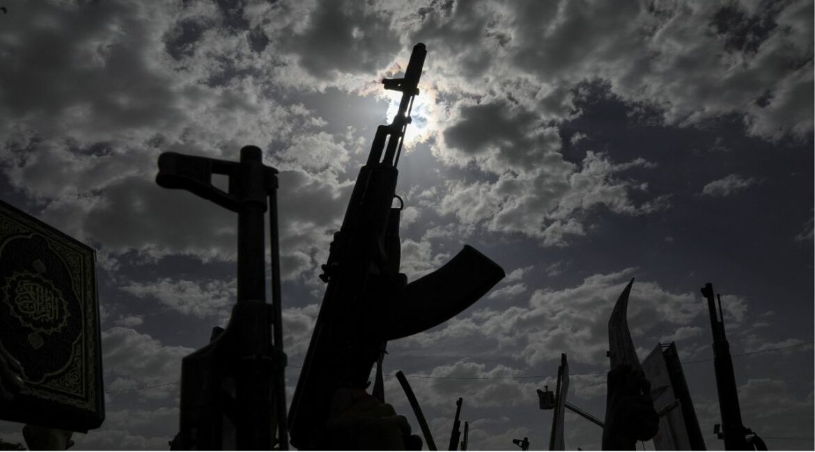 Protesters, predominantly supporters of the Houthi movement, hold up their weapons as they rally to demonstrate solidarity with Palestinians, vowing that U.S. airstrikes would not deter their support, in Sanaa, Yemen April 25, 2025. (REUTERS/Khaled Abdullah)