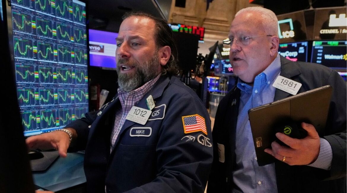 Specialist Michael Pistillo, left, and trader Thomas Ferrigno work on the floor of the New York Stock Exchange, Thursday, April 10, 2025. (AP/Richard Drew)