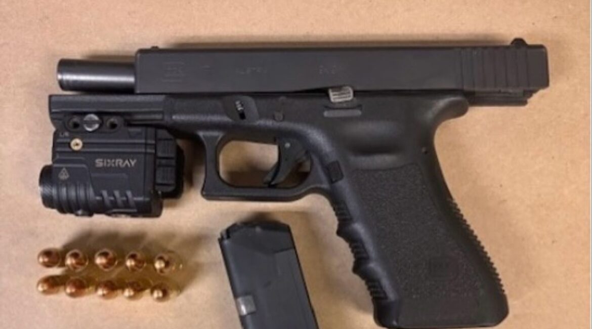 A man was arrested in downtown Fresno for DUI and multiple gun-related charges after officers found a loaded handgun in his vehicle during a traffic stop. (Fresno PD)