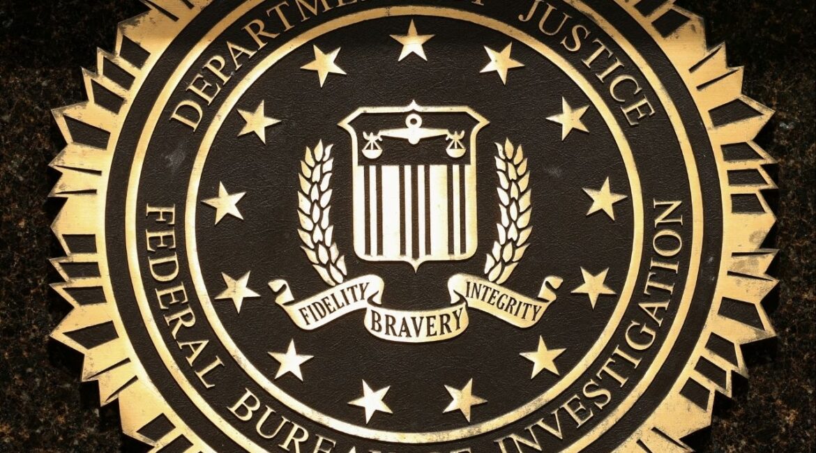 A view shows the Federal Bureau of Investigation seal on the J. Edgar Hoover Building on the day that FBI Director Kash Patel announced that he’s redeploying 1,500 FBI agents and shutting down the bureau’s storied headquarters, in Washington, D.C., U.S., May 16, 2025. REUTERS/Kevin Lamarque/File Photo
