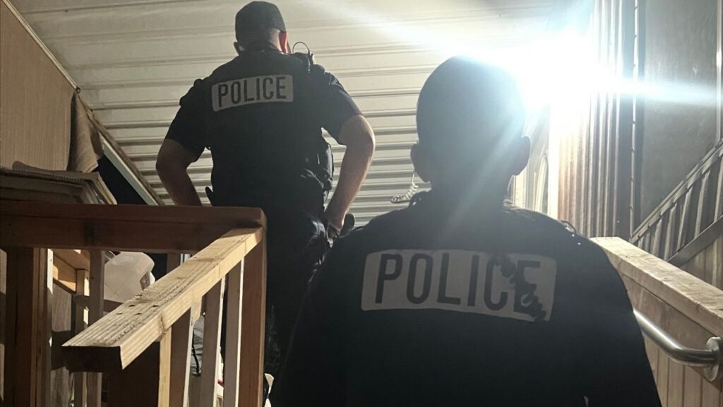 Fresno police speak with a Fresno resident after a call of a domestic disturbance on Wednesday, May 23, 2025. (GV Wire/Anthony W. Haddad)