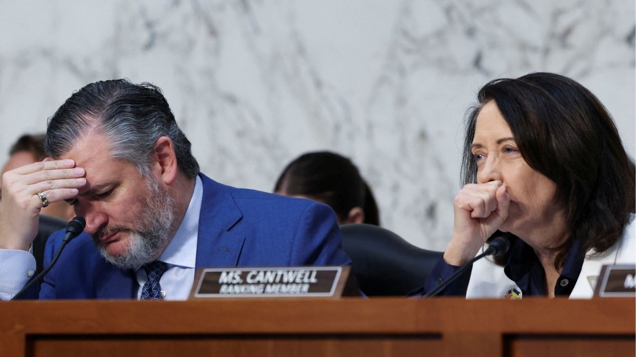 Senate Commerce, Science, and Transportation Committee Chairman Ted Cruz (R-TX) and Ranking Member Cantwell (D-WA) listen as OpenAI CEO Sam Altman testifies before a Senate Commerce, Science, and Transportation Committee hearing titled “Winning the AI Race: Strengthening U.S. Capabilities in Computing and Innovation,” on Capitol Hill in Washington, D.C., U.S., May 8, 2025. (REUTERS/Jonathan Ernst)