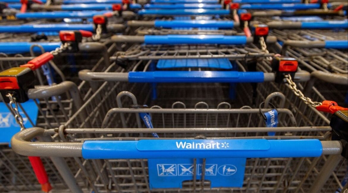 Shopping carts are lined up inside a Walmart store in Hamilton, Ontario, Canada, January 28, 2025. REUTERS/Carlos Osorio/File photo