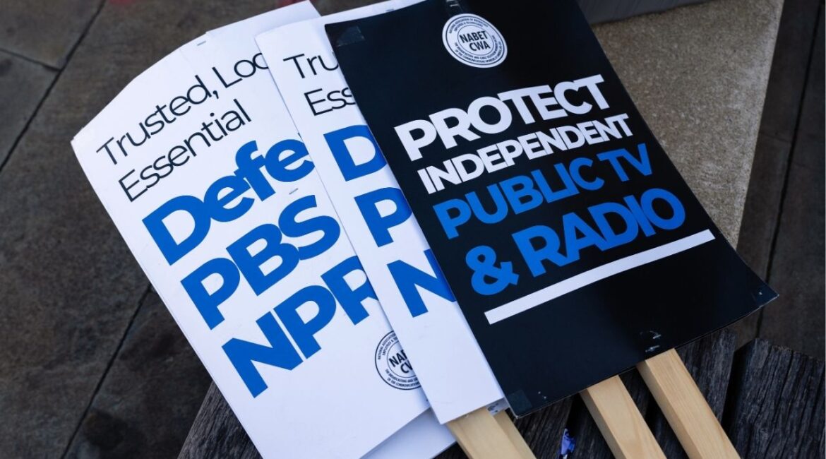 Signs supporting NPR outside its headquarters in Washington on March 26, 2025. The Trump administration has accused NPR and PBS of using public funds to produce biased coverage and “left-wing propaganda.” (Eric Lee/The New York Times)