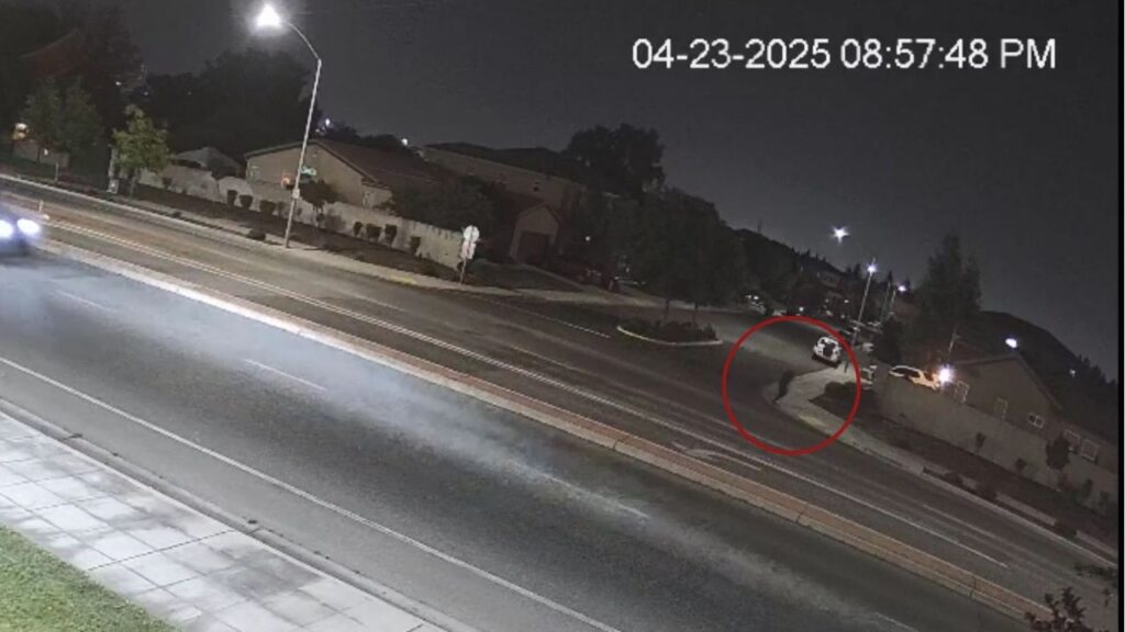 Surveillance video on Nees, west of Willow, shows the male suspect running west on the south sidewalk on April 23, 2025. (Clovis PD)