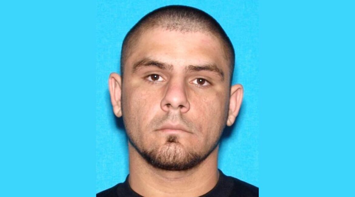 A Fresno man already jailed, Michael Fitch (pictured), 35, for a 2021 homicide has been charged in the 2022 shooting death of Ursolo “Frank” Sermeno after DNA evidence linked him to the crime, police said. (Fresno PD)