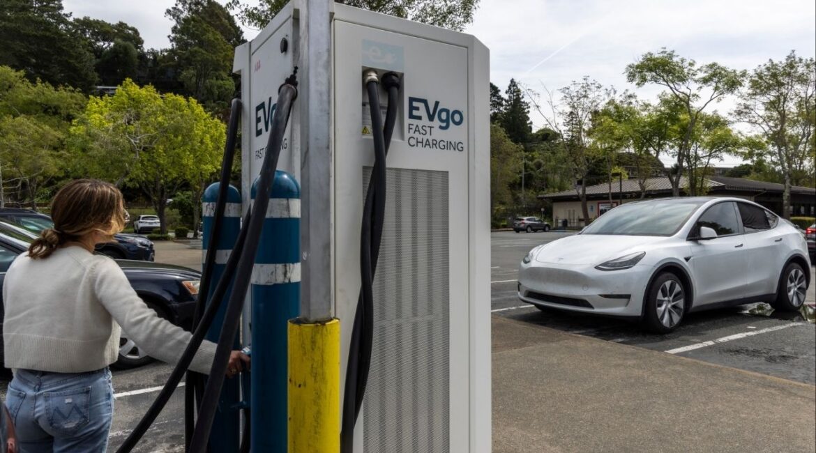 A Tesla vehicle next to an EVgo charging station in Mill Valley, Calif., April 7, 2025. President Donald Trump signed joint resolutions of Congress on Thursday, June 12, that block California’s effort to phase out gasoline-powered vehicles, his latest attempt to reduce the power of the nation’s most populous state. (Rachel Bujalski/The New York Times)