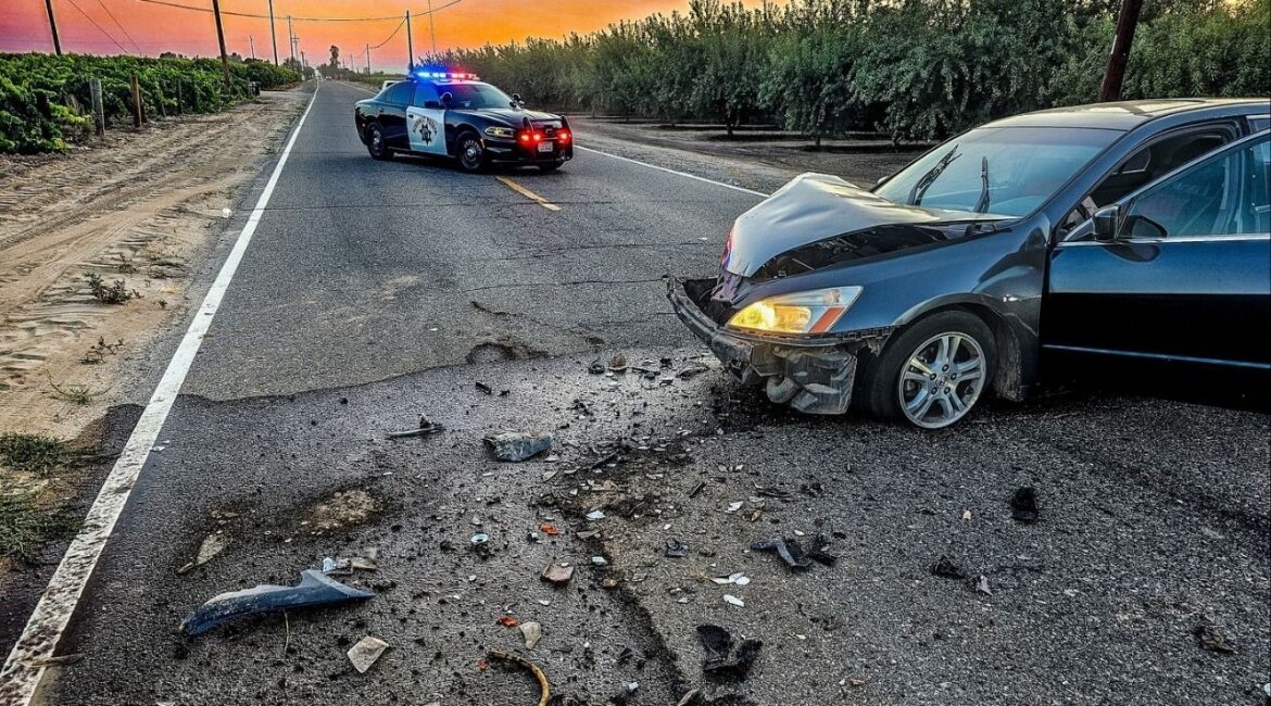 A distracted driver crashed into a spray rig on a rural road, prompting officials to urge caution and remind motorists to share the road with farm equipment. (CHP)